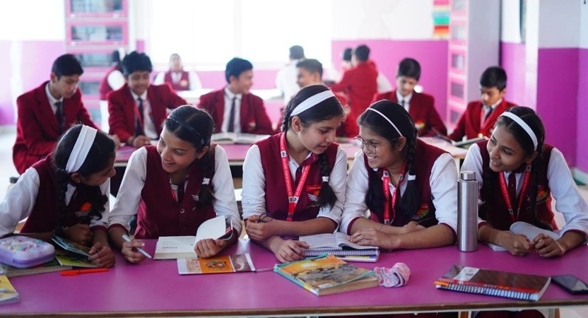 GK Heritage School, Shivpur, doing group study